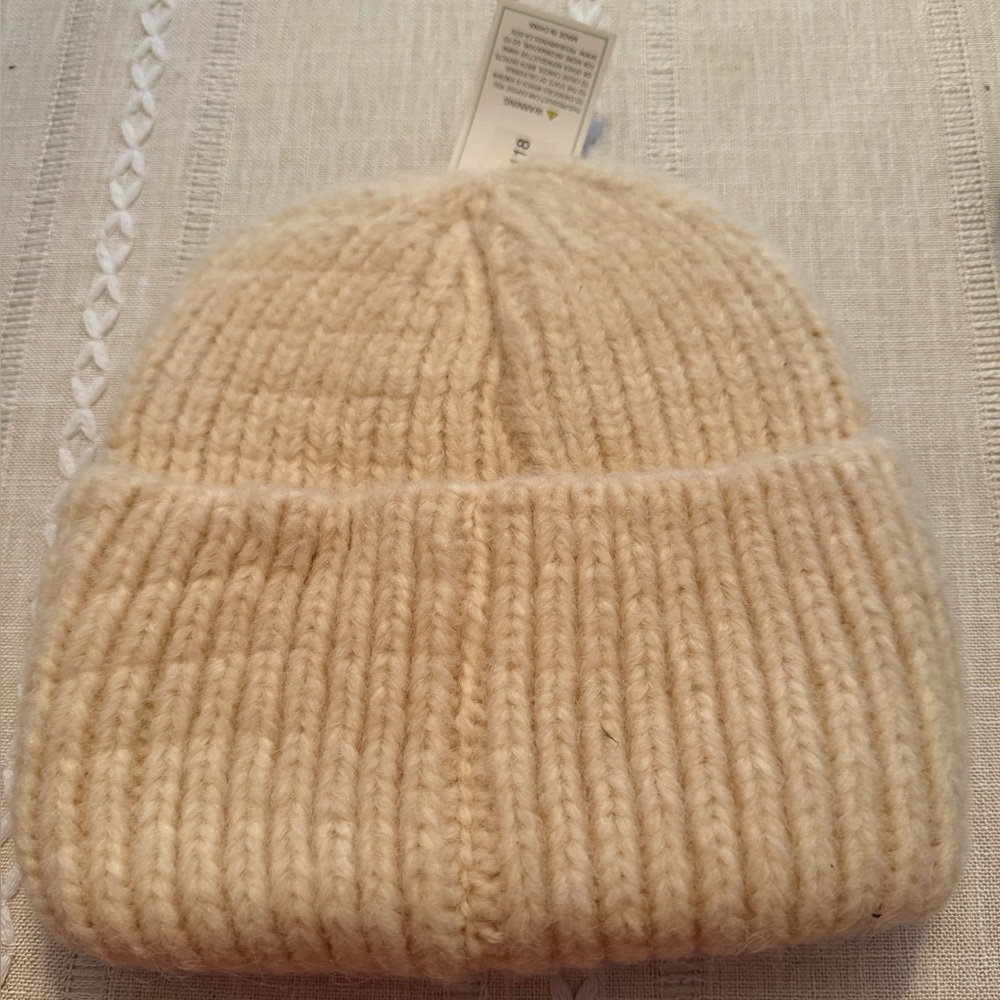 Cozy Cream Knit Beanie with Black Bows - Picture 2 of 2